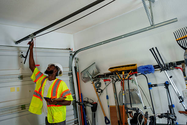Professional Garage Door Panel Replacement technician working in Bayshore, OR